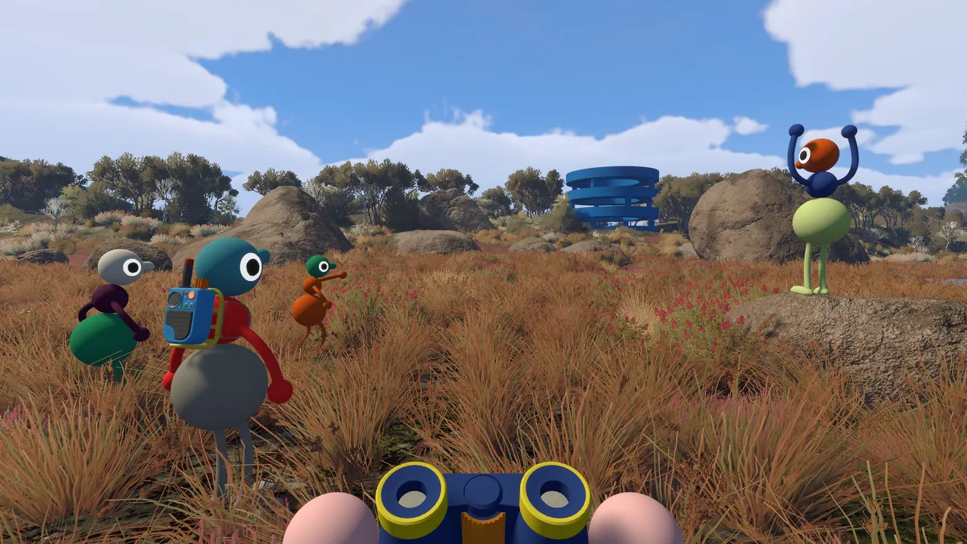 First-person view in Big Walk, holding binoculars while three teammates walk ahead through dry scrubland.